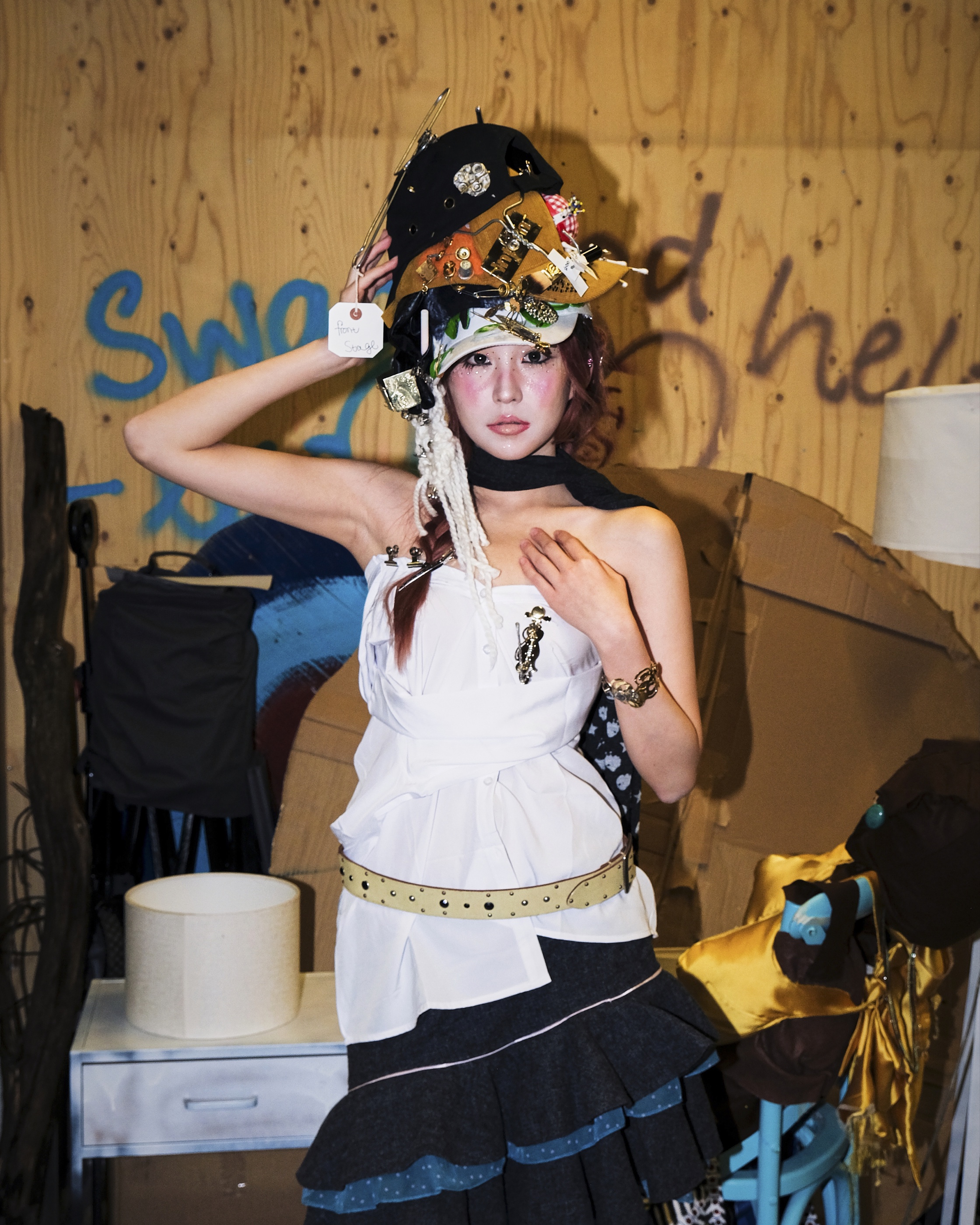 Full look worn backstage at Central Saint Martins among show props