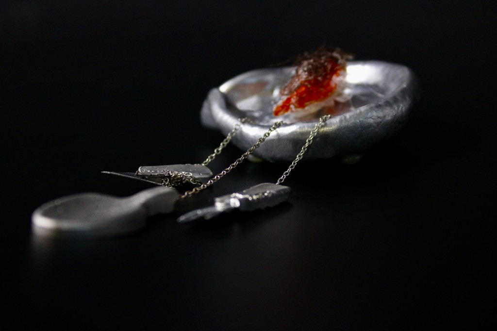 Heat — brooch with chains