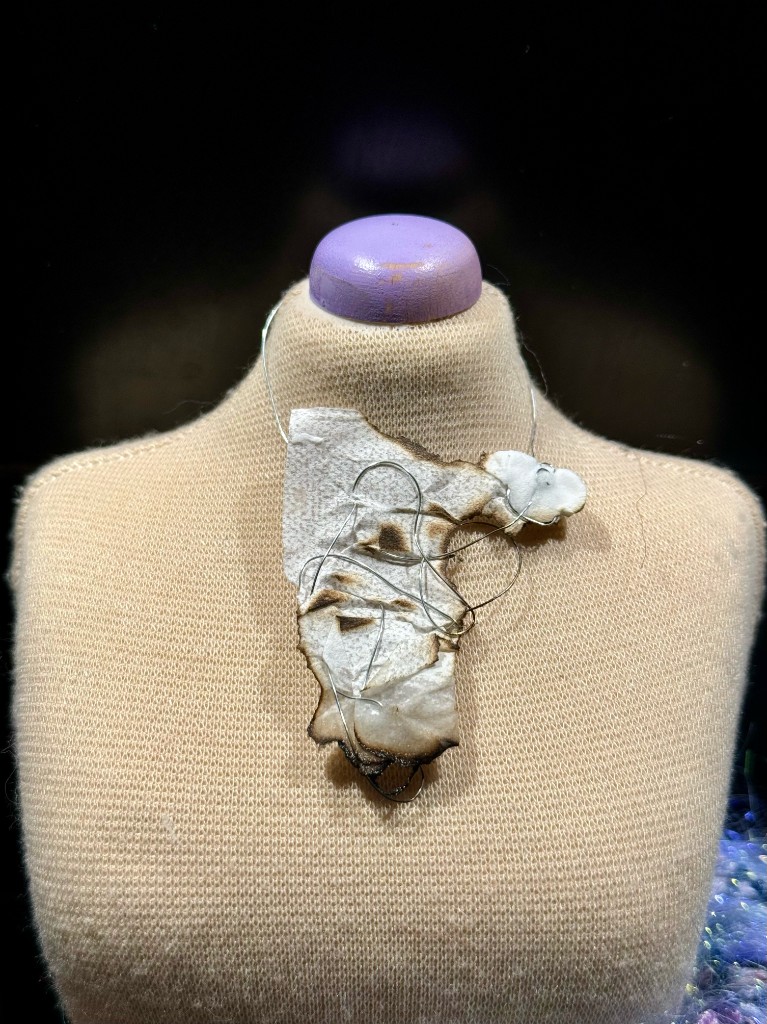 Ember — necklace on mini mannequin, front view