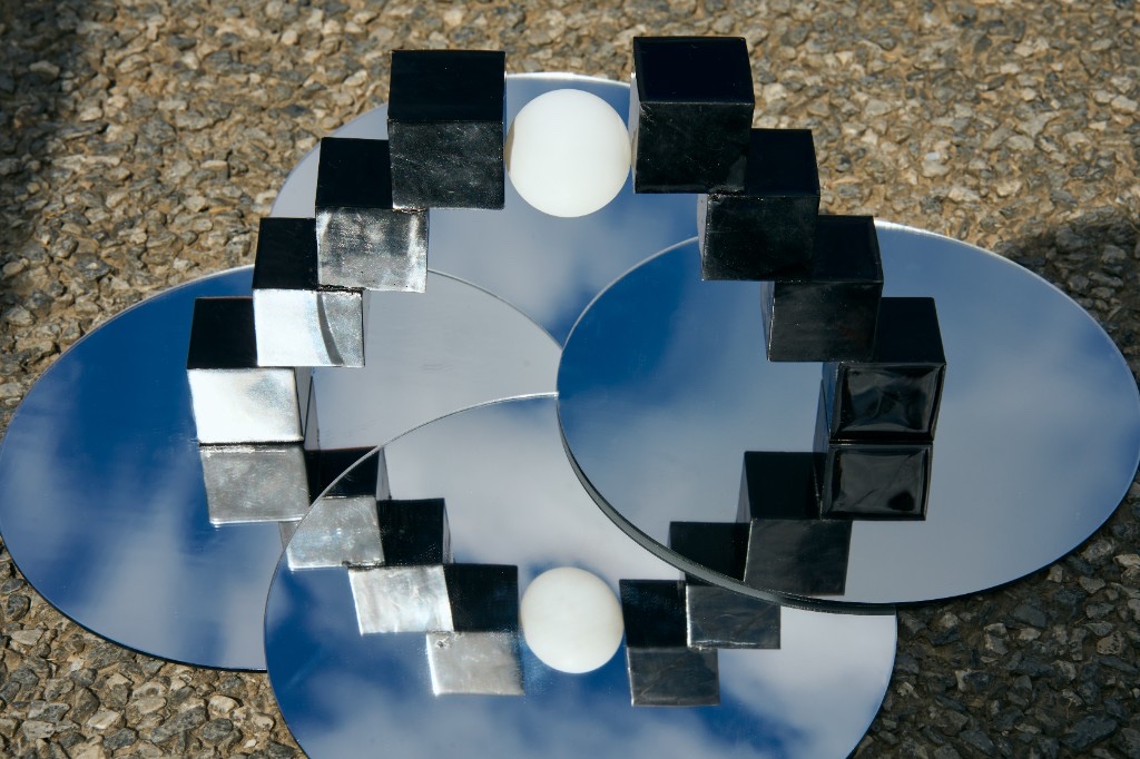 Round Heaven, Square Earth — mirrors, black cubes and white sphere